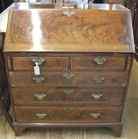 George III inlaid mahogany bureau(-)
